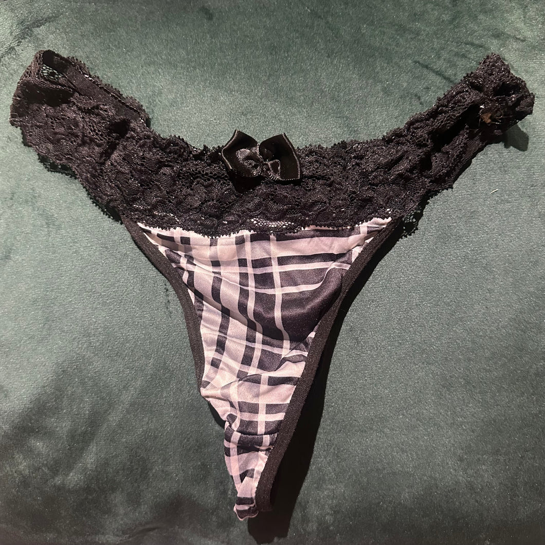 Silky thong with lace detail..